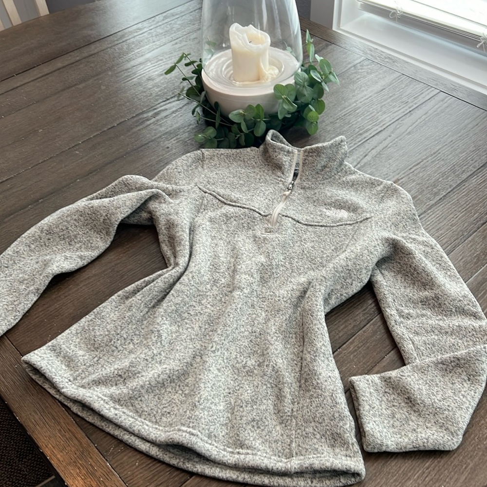 The North Face extra cozy, high collar jacket sweatshirt. Fuzzy fleece inside.